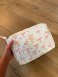 Pochette à noeuds rose